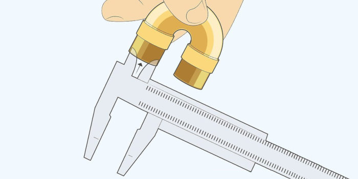 An illustration of a hand holding a trumpet's second valve slide while a caliper measured the inside diameter for bore size